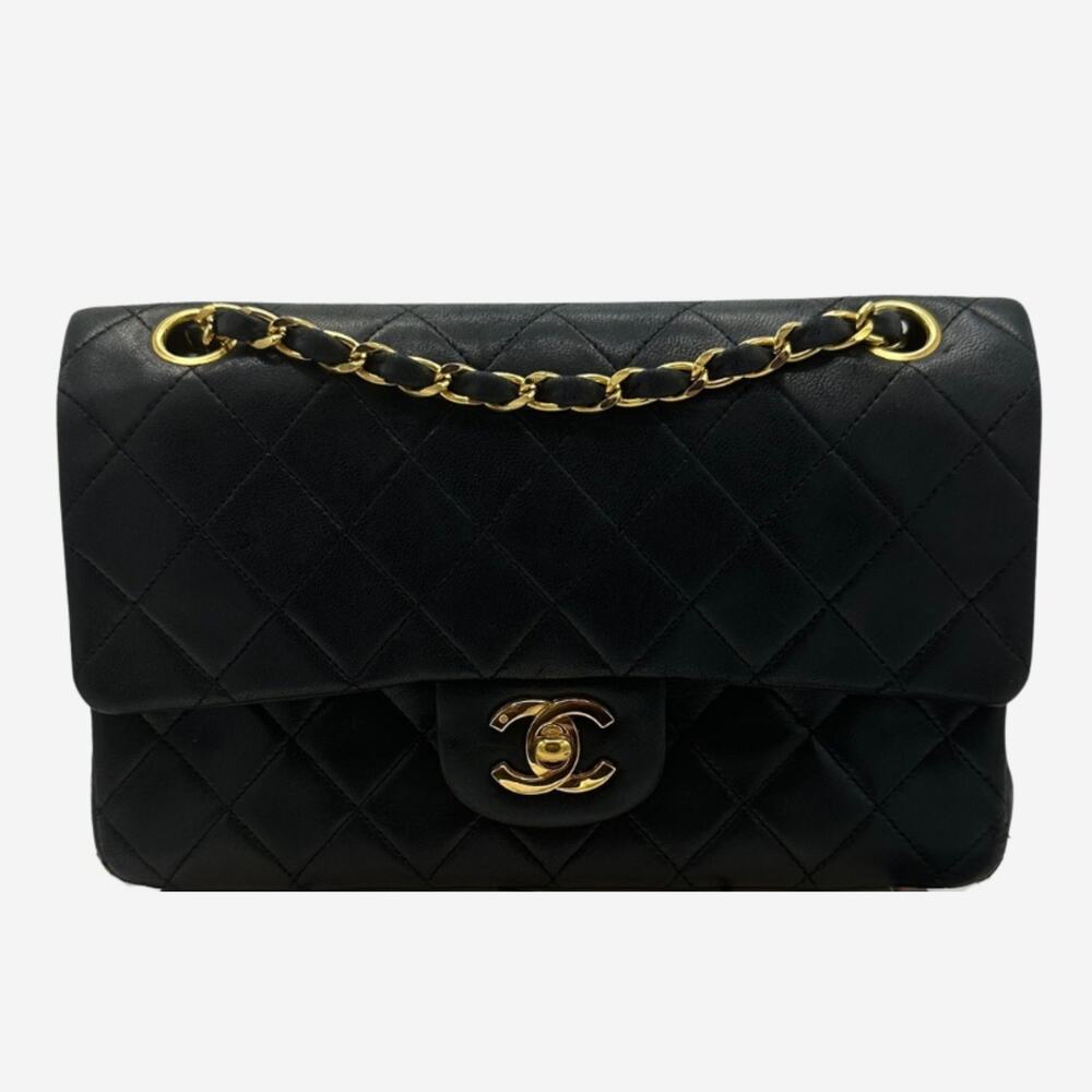 CHANEL Black Quilted Shoulder Bag with Gold Accents